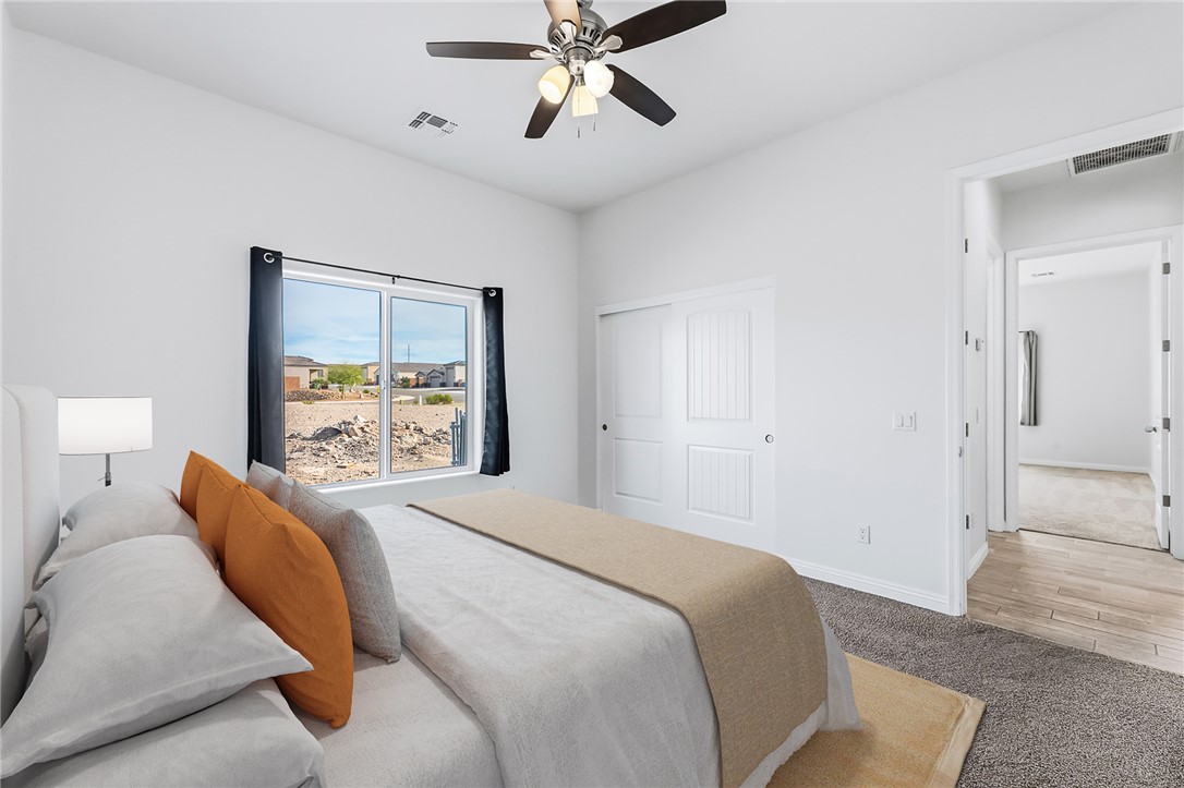 2385 Corwin Road Bullhead City, AZ 86442 - Photo 50 of 78 a bedroom with a bed and a window