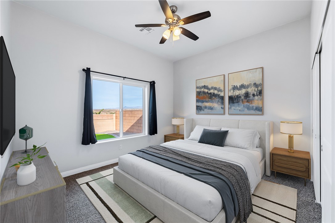 2385 Corwin Road Bullhead City, AZ 86442 - Photo 52 of 78 a bedroom with a bed and a window