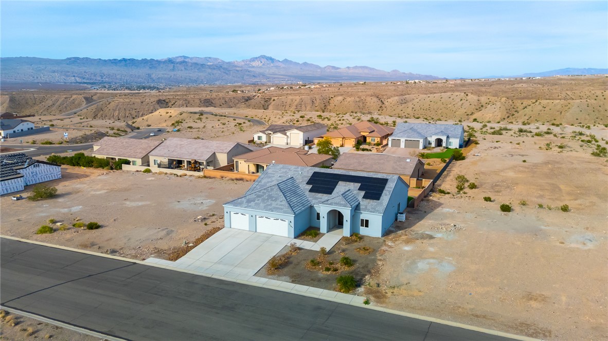 2385 Corwin Road Bullhead City, AZ 86442 - Photo 71 of 78 an aerial view of residential houses with outdoor space