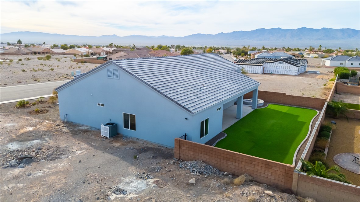 2385 Corwin Road Bullhead City, AZ 86442 - Photo 77 of 78 an aerial view of a house with a garden and lake view