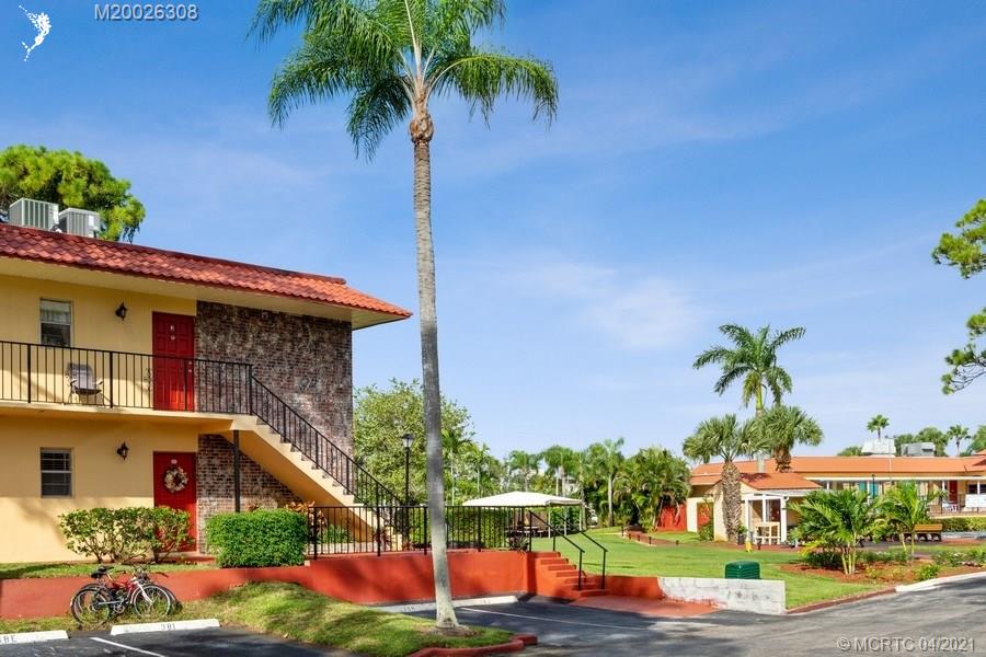 1989 Southwest Palm City Road, Unit J Stuart, FL 34994 - Photo 2 of 16 #38 J END UNIT, just steps from the Club House and Community Pool