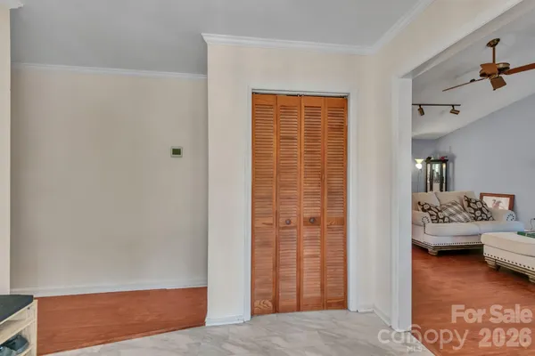 a view of livingroom with furniture and cabinet