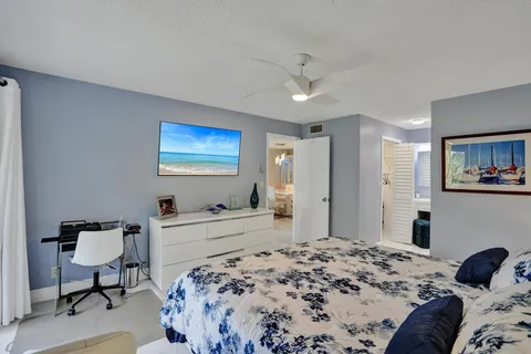 a bed room with a bed and a window