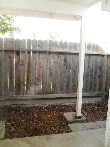 a bathroom with a toilet and shower