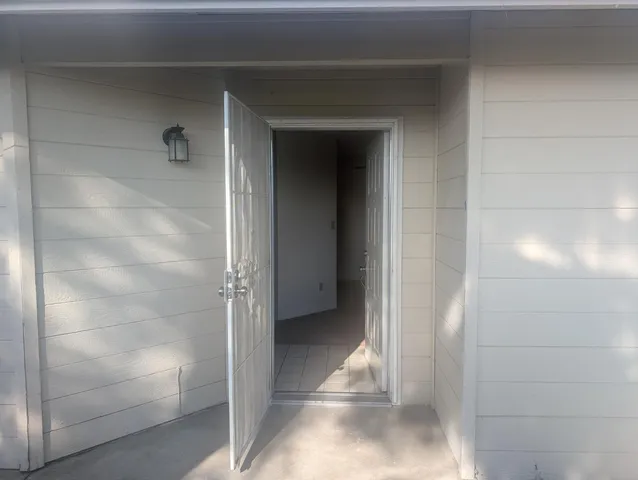 a view of storage and utility in a bathroom