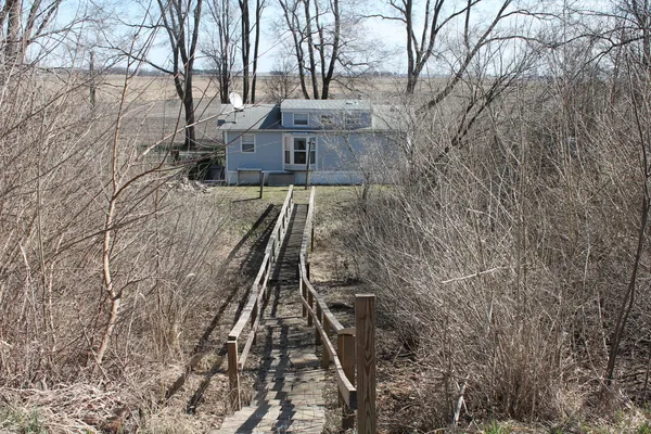 a view of a house with a snow
