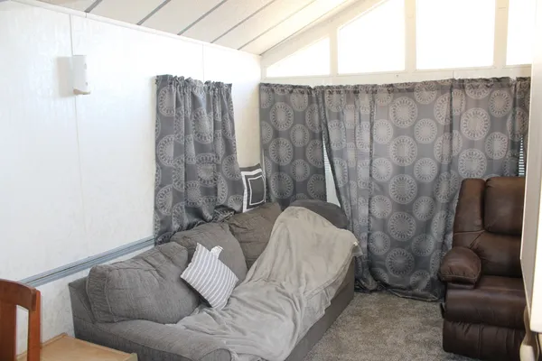 a living room with furniture and a couch