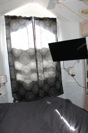 a kitchen with a refrigerator and cabinets