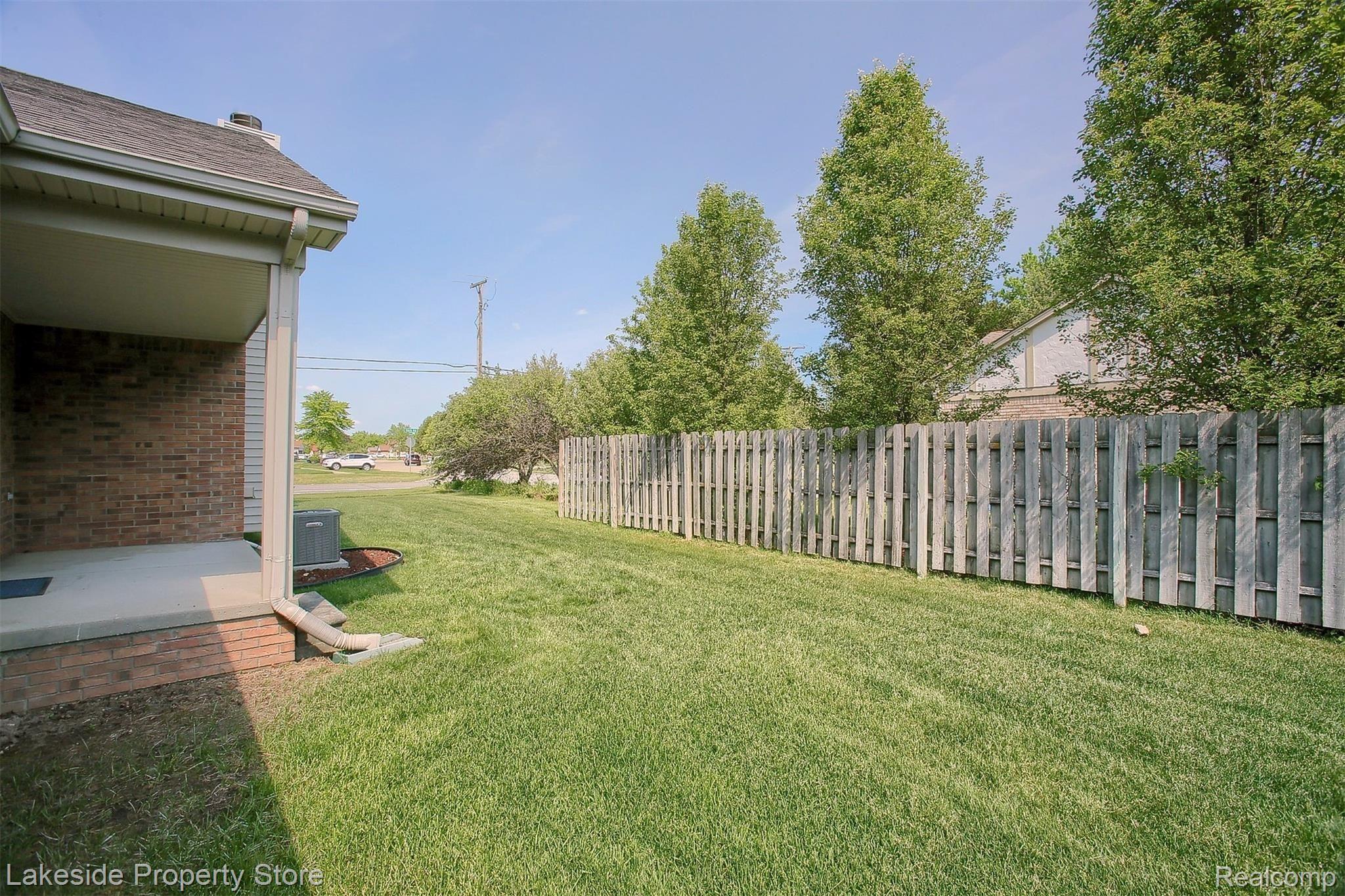 15902 Pheasant Ridge Drive Macomb, MI 48044 - Photo 23 of 24 23-Backyard.jpg
