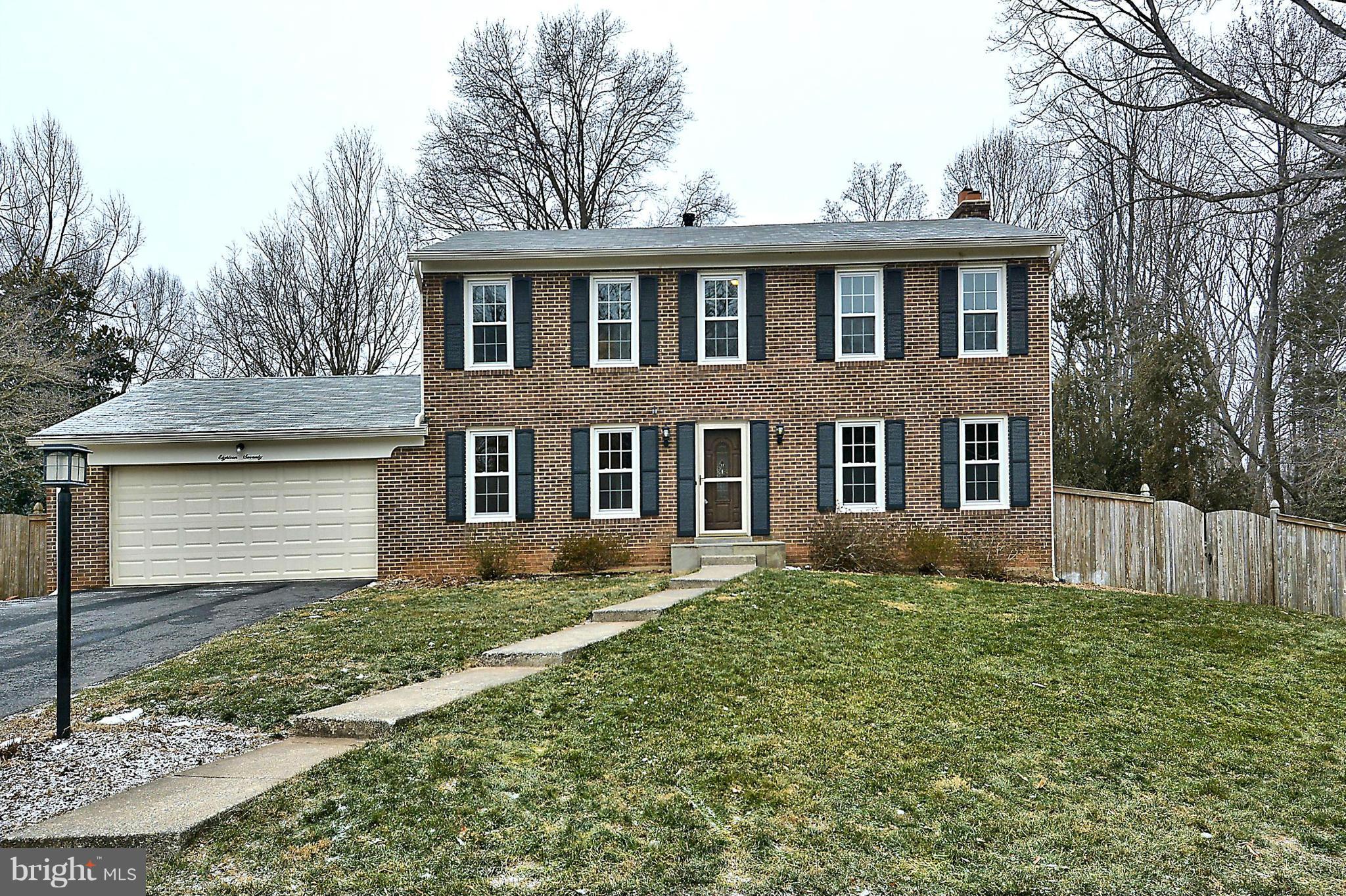 1870 Beulah Road Vienna, VA 22182 - Photo 27 of 30 a front view of a house with a yard