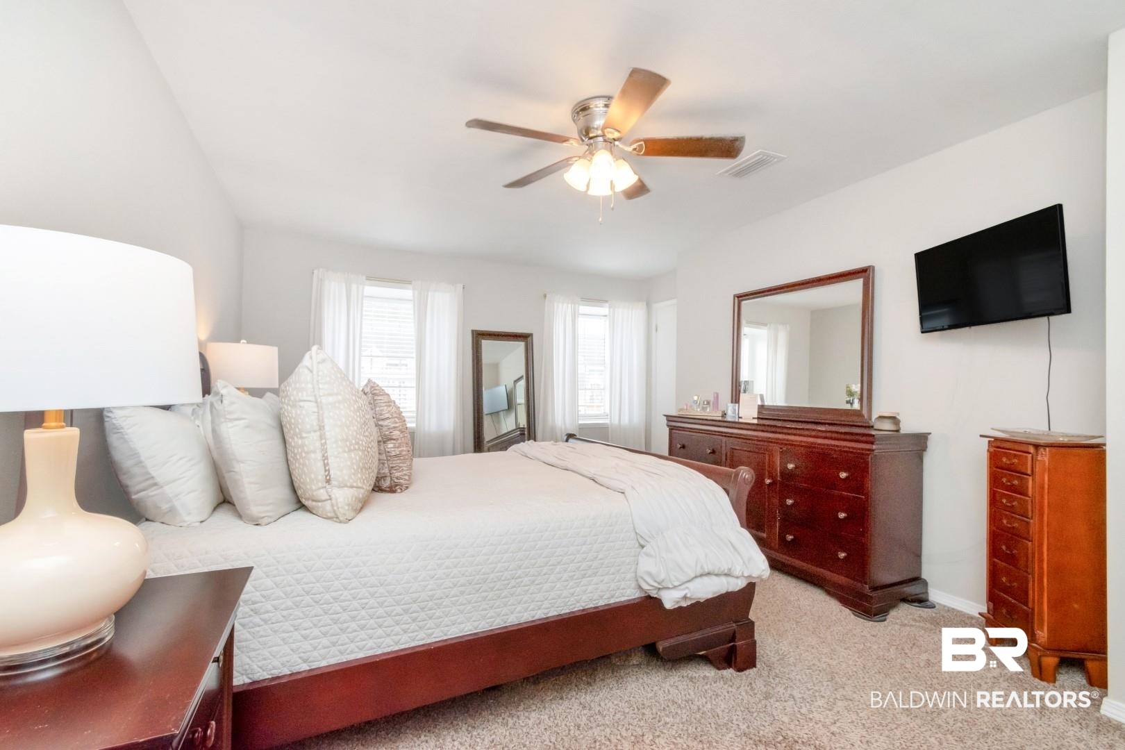 110 Du Rhu Drive, Unit C Mobile, AL 36608 - Photo 9 of 14 Bedroom with light carpet and ceiling fan