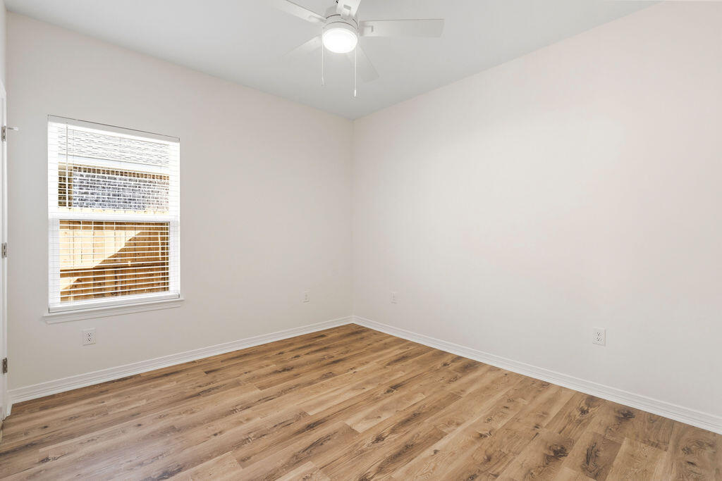 3812 Golden Acres Circle Crestview, FL 32539 - Photo 5 of 10 an empty room with a window