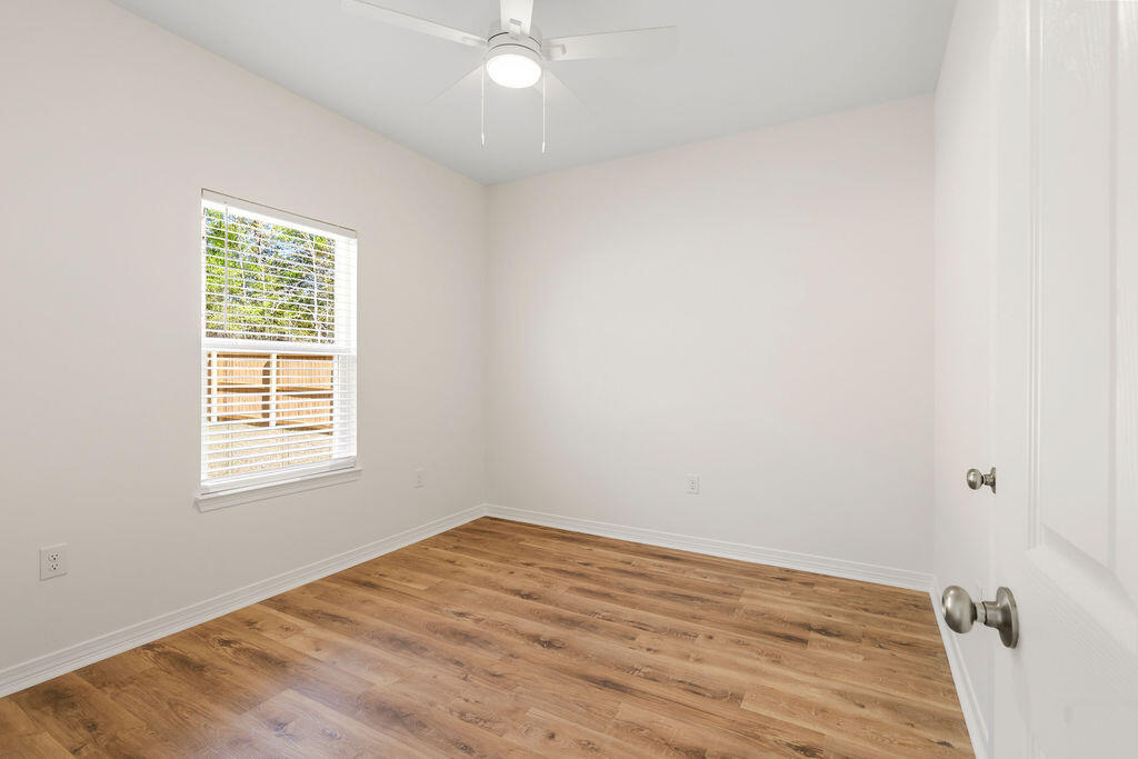 3812 Golden Acres Circle Crestview, FL 32539 - Photo 6 of 10 an empty room with a window