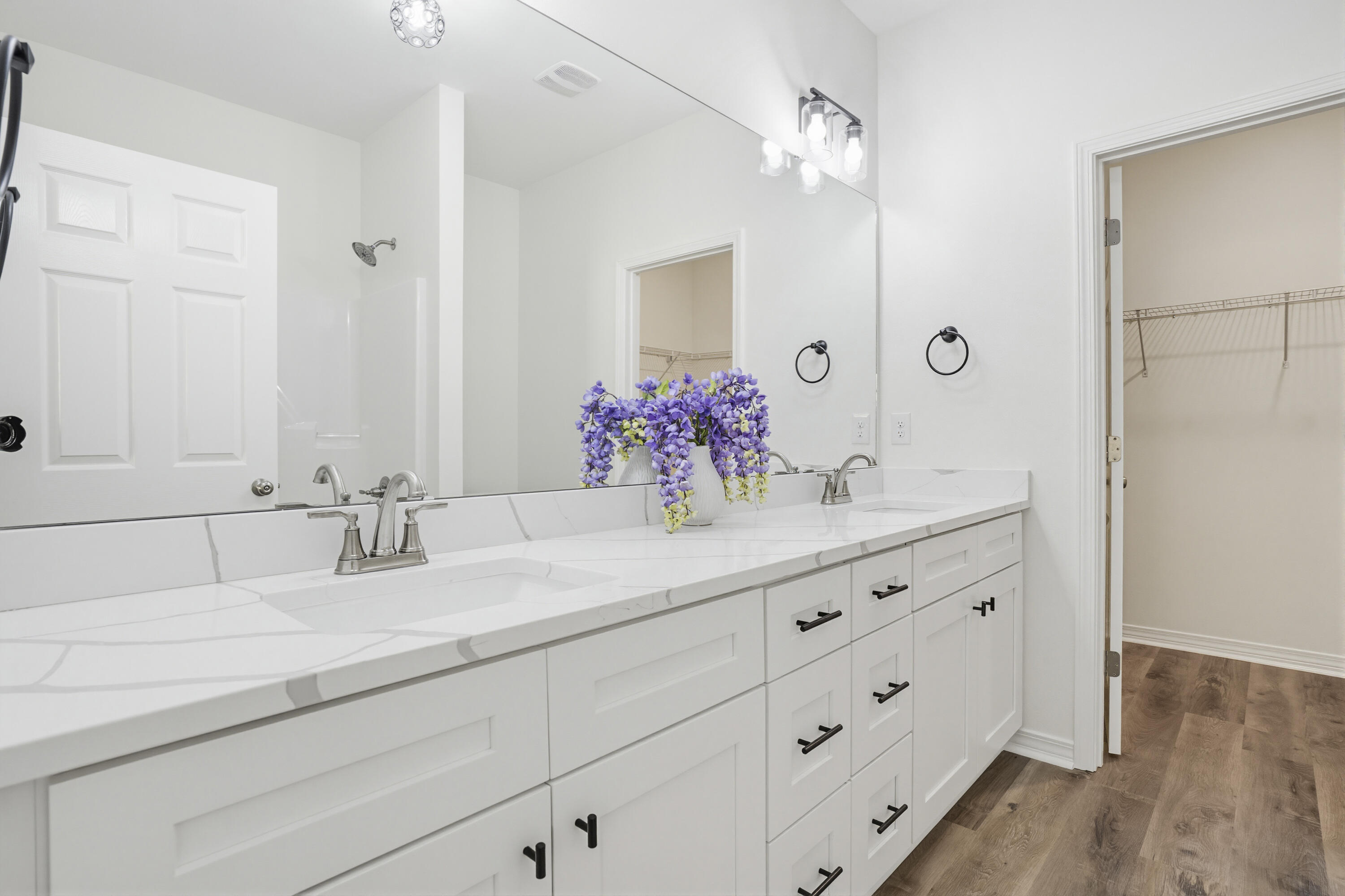 3812 Golden Acres Circle Crestview, FL 32539 - Photo 8 of 10 a bathroom with a sink double vanity and a mirror