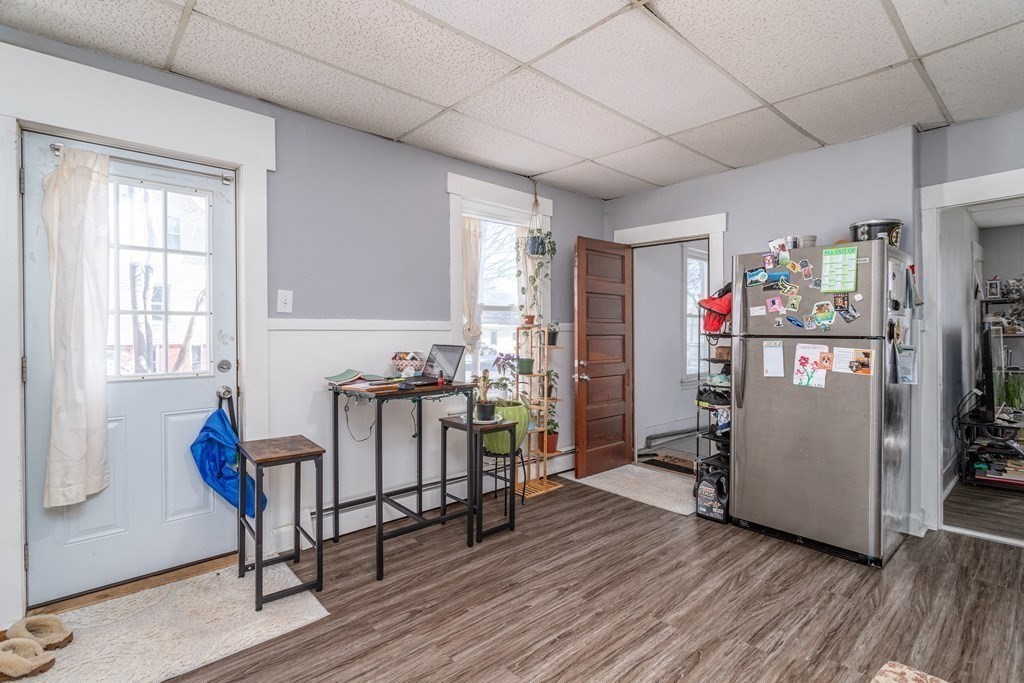 101-105 Baker Street Gardner, MA 01440 - Photo 25 of 37 a view of a dining room with furniture window and wooden floor