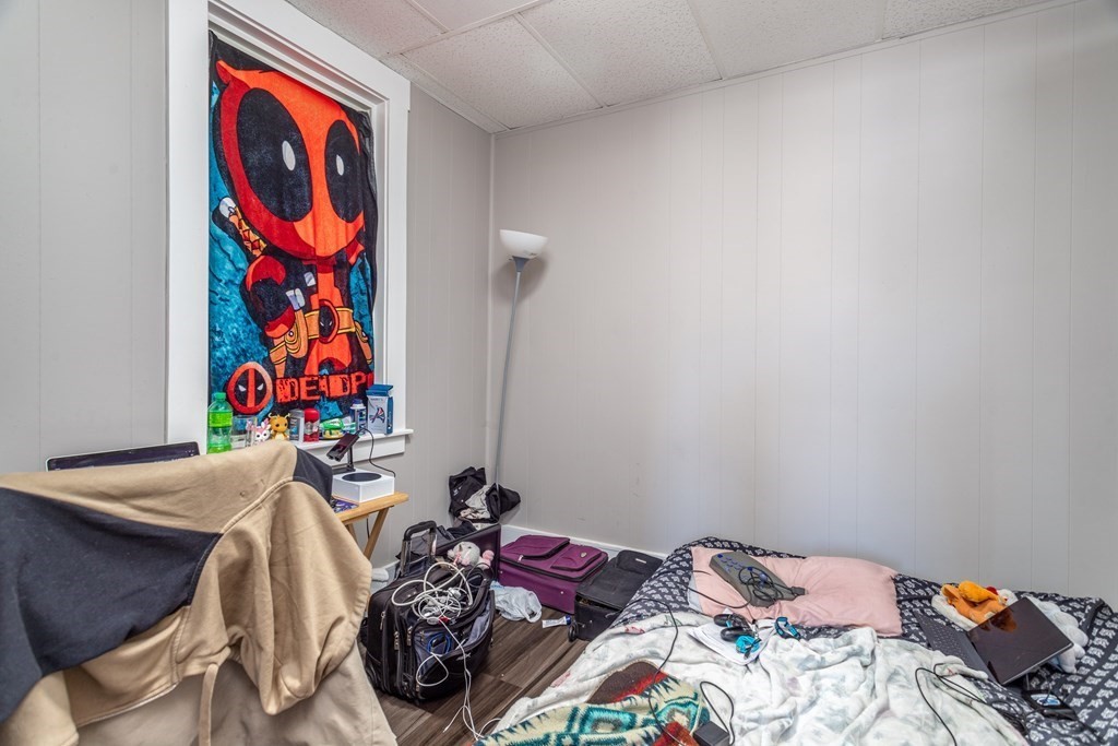 101-105 Baker Street Gardner, MA 01440 - Photo 8 of 37 a bedroom with a bed and furniture