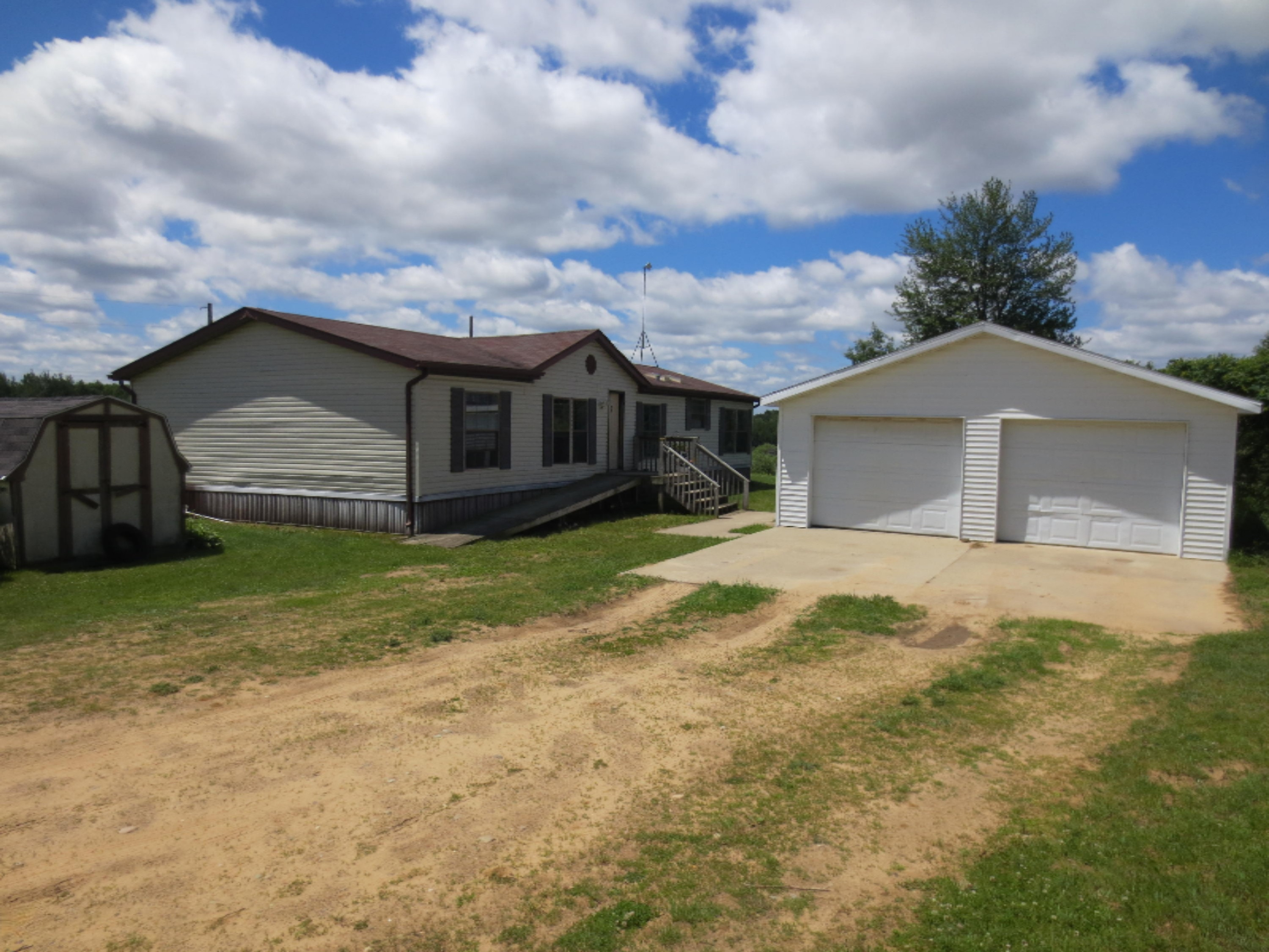 1542 South Sherman Road Remus, MI 49340 - Photo 1 of 37 IMG_1644