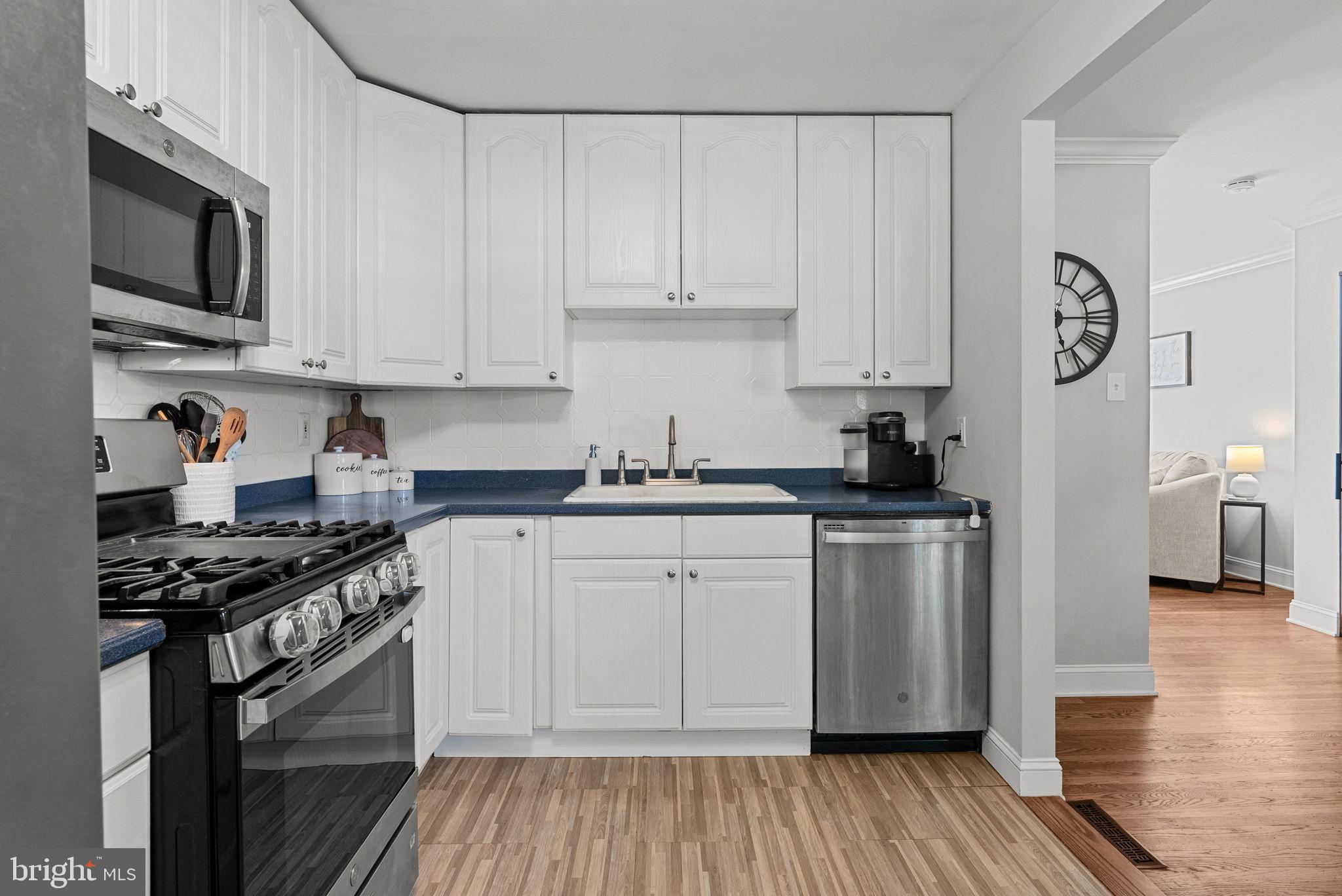 3422 Orion Road Philadelphia, PA 19154 - Photo 12 of 30 Modern kitchen with white cabinetry.