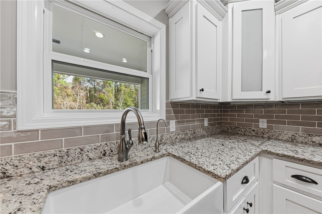 113 Logans Way Kingsland, GA 31548 - Photo 12 of 32 Farm house sink with a window to the spacious back yard.
