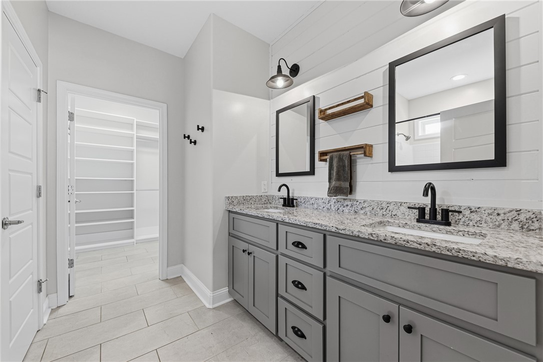 113 Logans Way Kingsland, GA 31548 - Photo 16 of 32 Primary bath with double vanity, ship lap wall, framed mirror