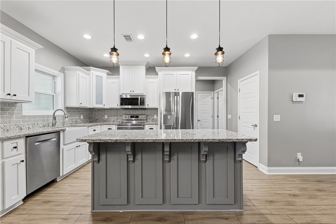 113 Logans Way Kingsland, GA 31548 - Photo 32 of 32 Kitchen Island is the hub of the open floorplan