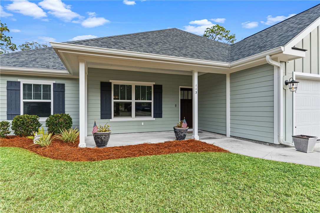 113 Logans Way Kingsland, GA 31548 - Photo 4 of 32 Peaceful front porch. Low maintenance hardi siding.