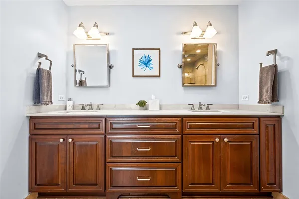 a bathroom with a sink and a mirror