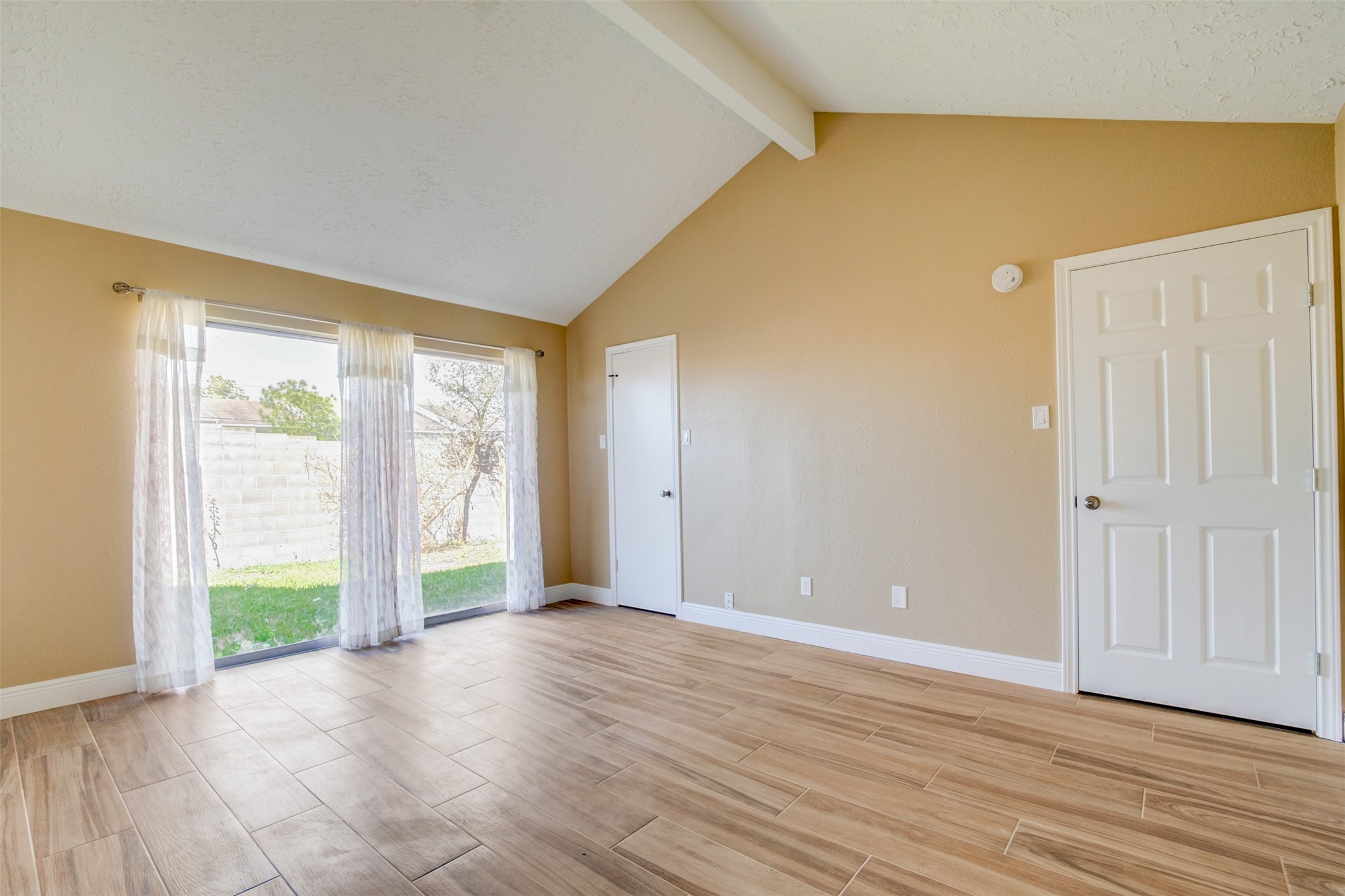 11840 Spring Grove Drive Houston, TX 77099 - Photo 15 of 27 Primary bedroom featuring walk-in closet and abundant natural light