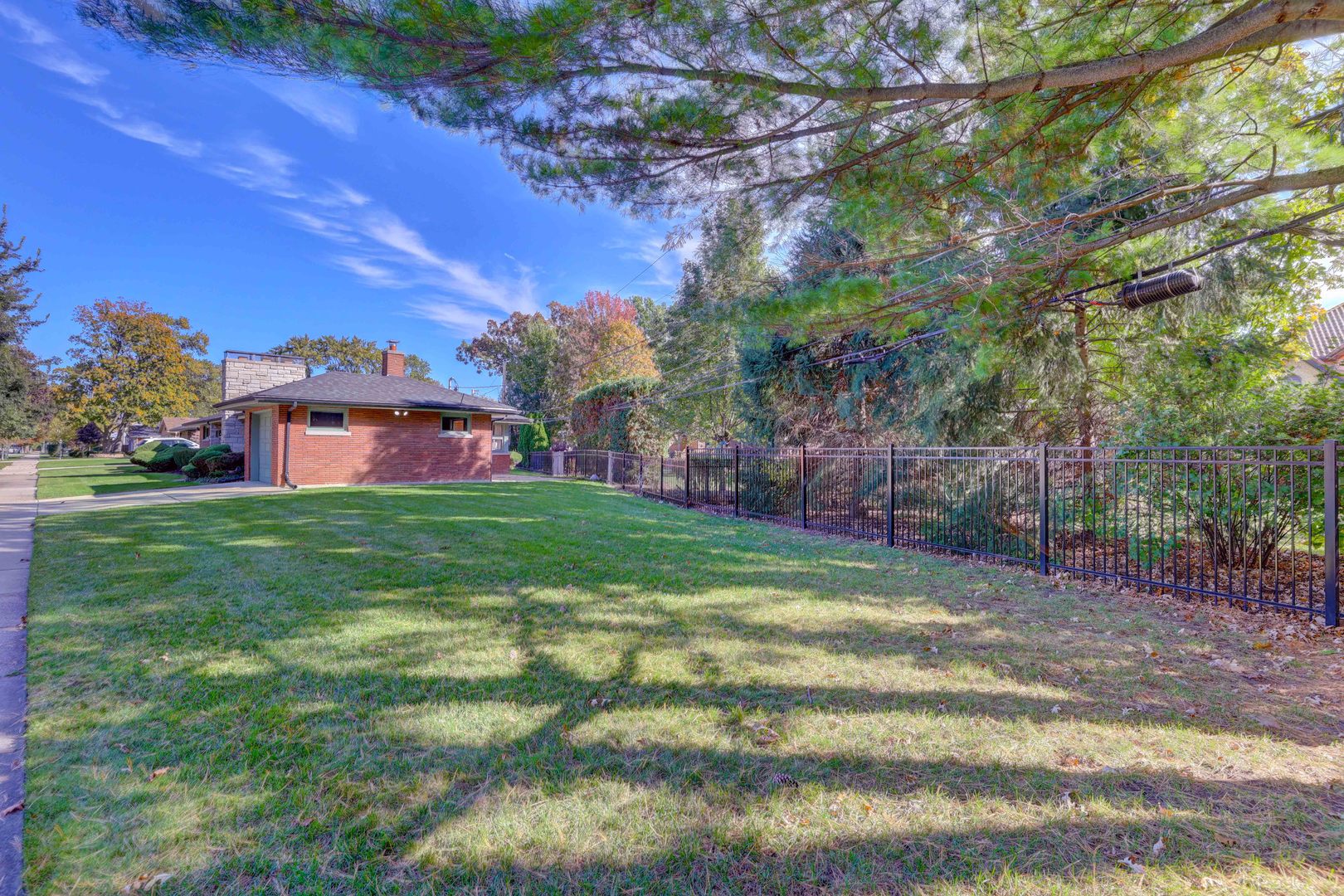 1401 Park Ridge Boulevard Park Ridge, IL 60068 - Photo 35 of 40 a view of a house with a big yard