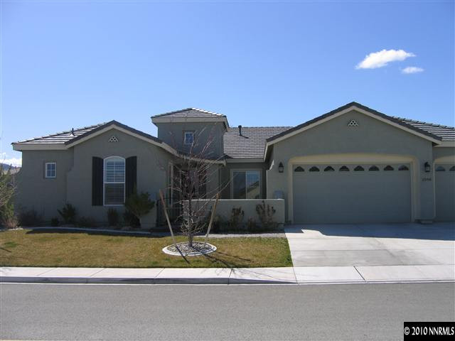 1598 Gemtown Court Reno, NV 89521 - Photo 1 of 5 a front view of a house