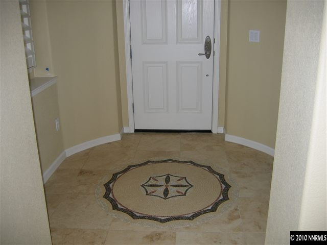 1598 Gemtown Court Reno, NV 89521 - Photo 2 of 5 a view of a room with a sink and a mirror