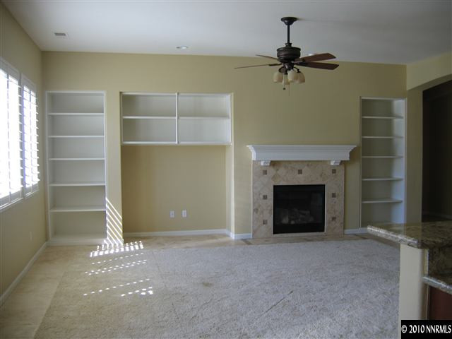 1598 Gemtown Court Reno, NV 89521 - Photo 3 of 5 a view of a livingroom with a fireplace