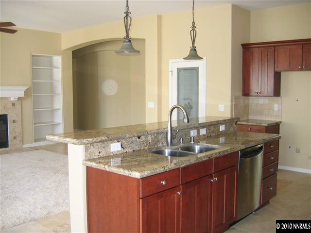 1598 Gemtown Court Reno, NV 89521 - Photo 4 of 5 a kitchen with a sink and cabinets