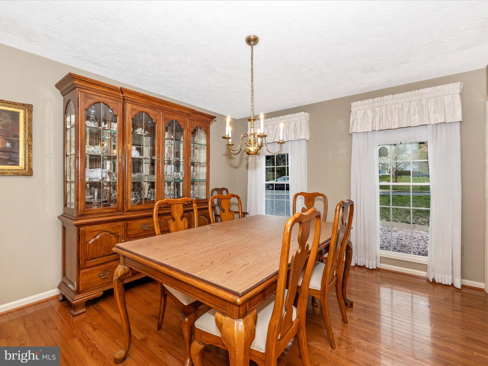 10 Knoll Side Lane Middletown, MD 21769 - Photo 12 of 84 a view of a dining room with furniture window and wooden floor