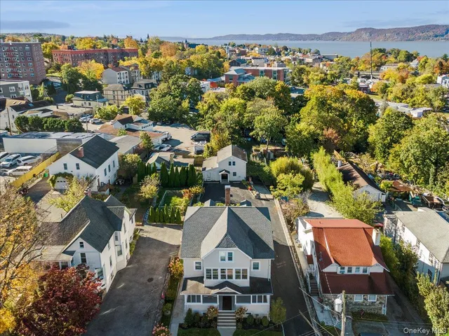 an aerial view of a house with a garden