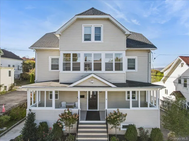 a kitchen with furniture and a stove top oven