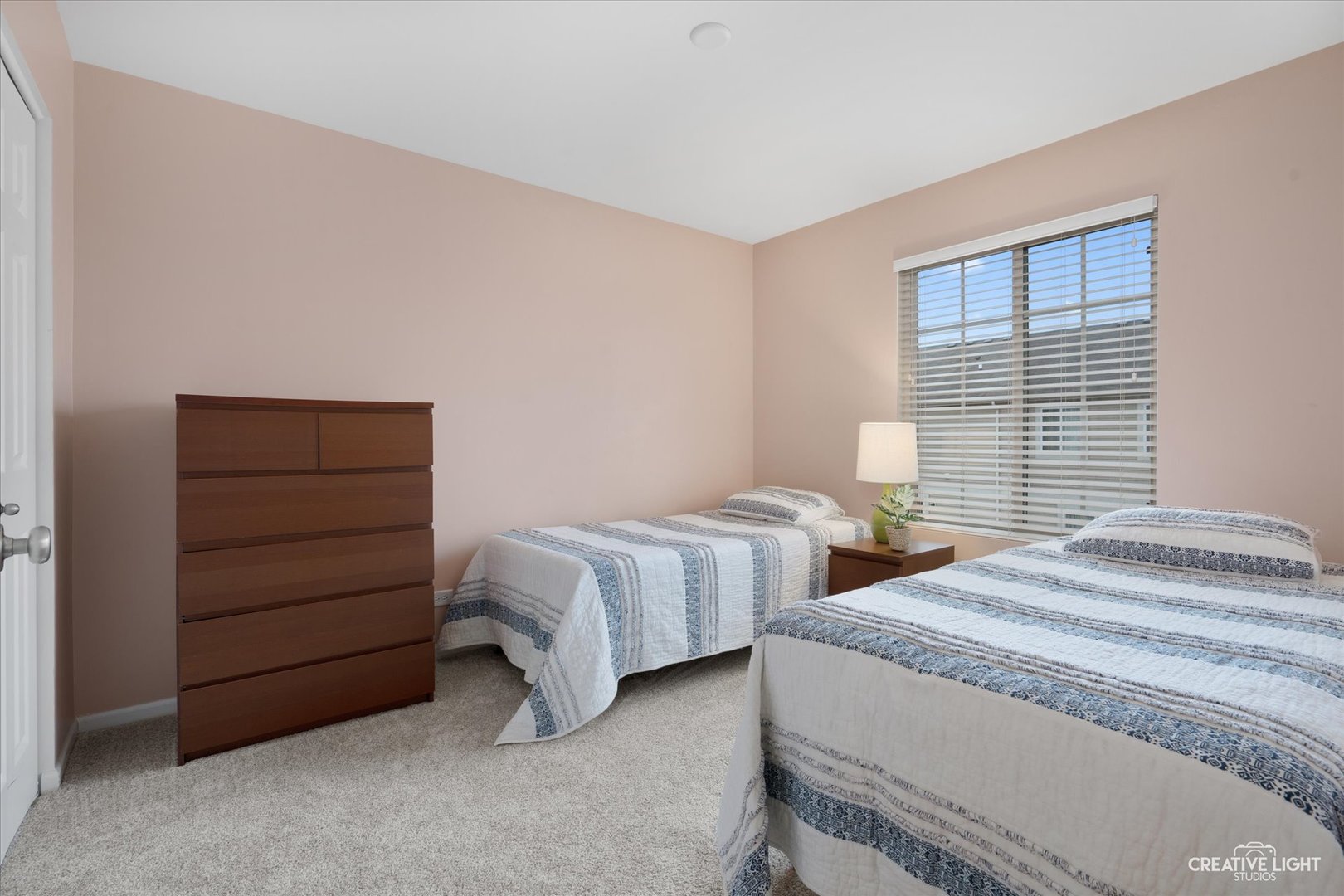 3426 Cameron Drive, Unit 3426 Elgin, IL 60124 - Photo 13 of 17 a bedroom with two beds and painted closet
