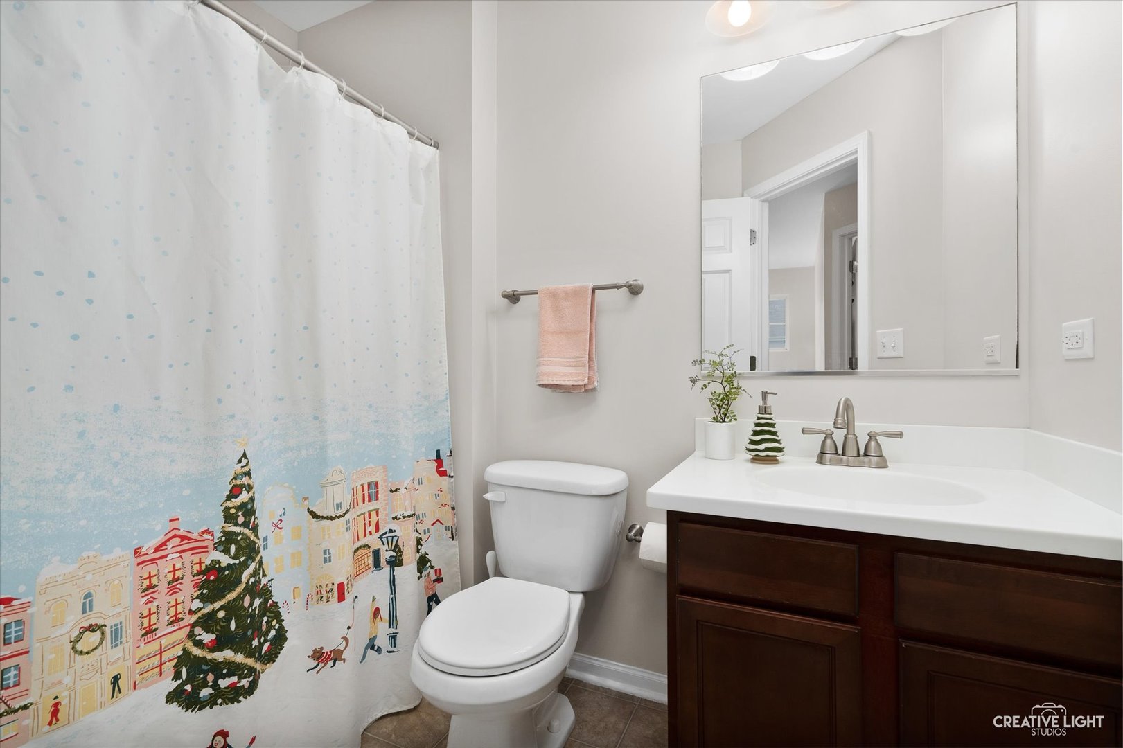 3426 Cameron Drive, Unit 3426 Elgin, IL 60124 - Photo 14 of 17 a bathroom with a sink toilet and a mirror