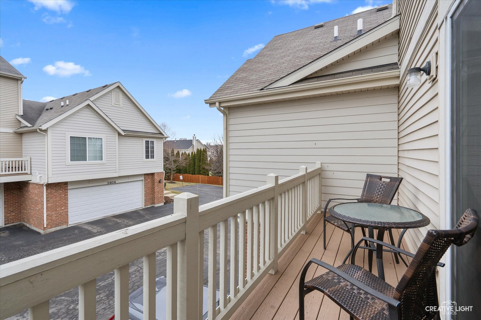 3426 Cameron Drive, Unit 3426 Elgin, IL 60124 - Photo 16 of 17 a view of a chair and table in the balcony