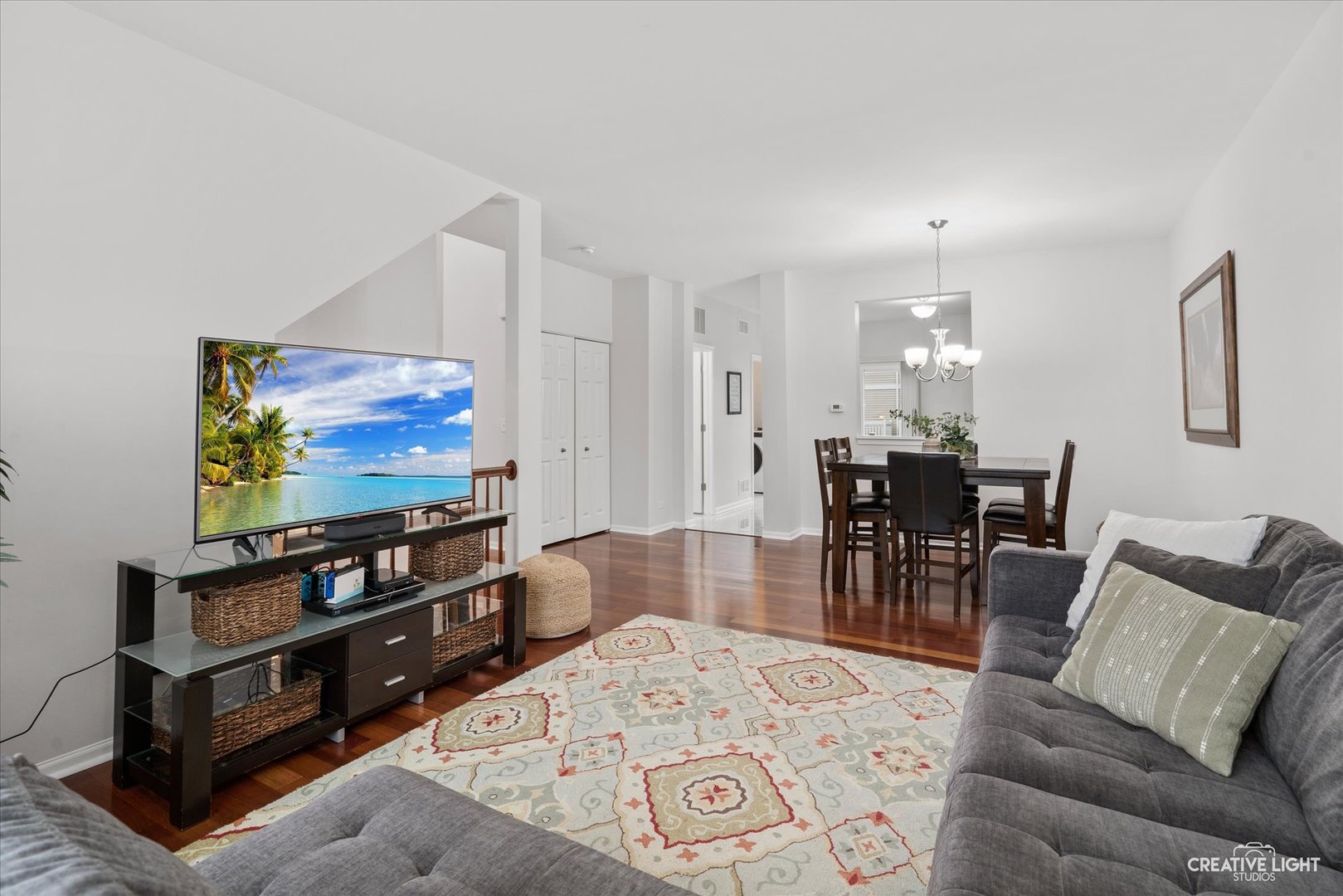 3426 Cameron Drive, Unit 3426 Elgin, IL 60124 - Photo 3 of 17 a living room with furniture and a flat screen tv