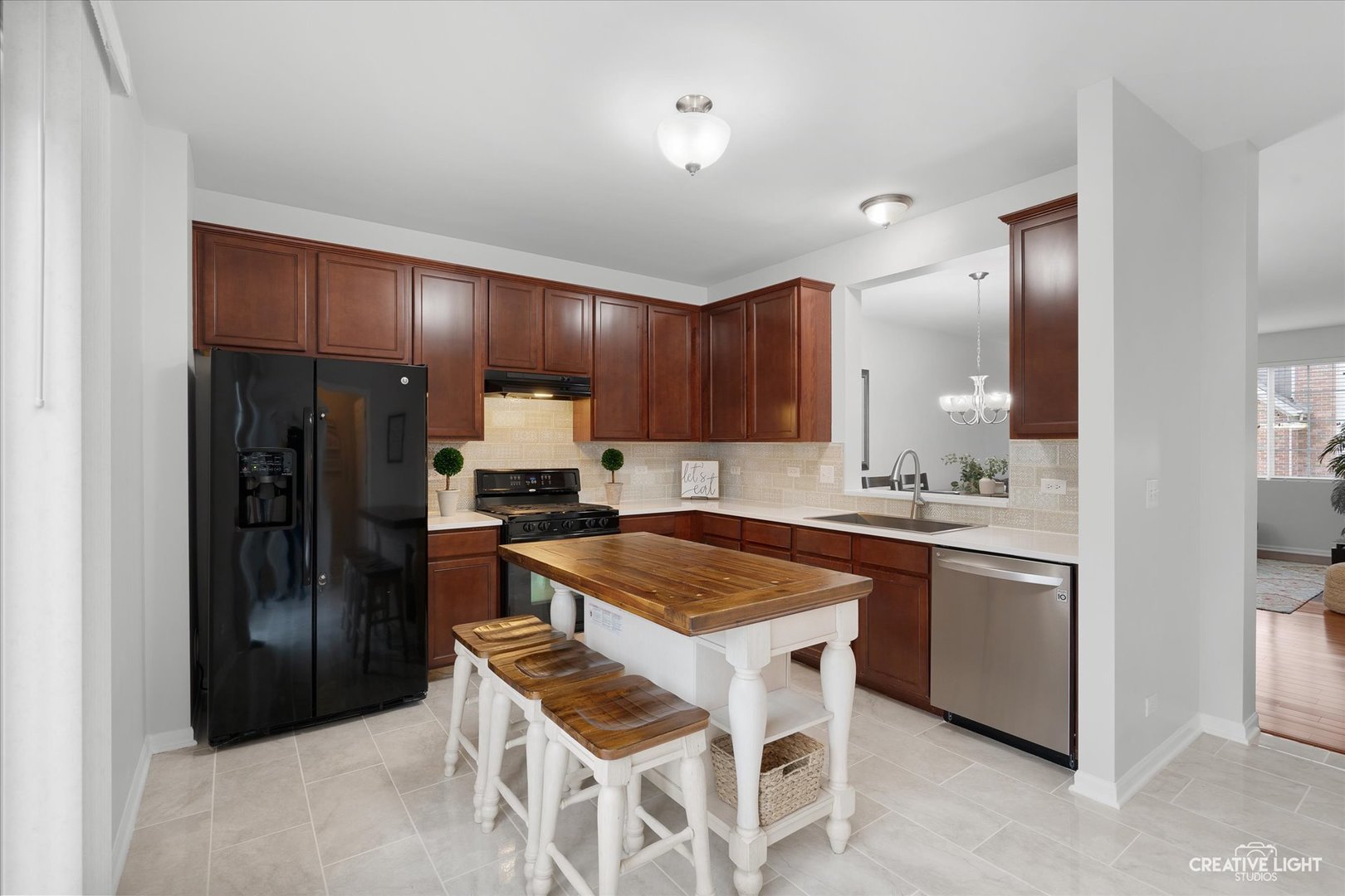 3426 Cameron Drive, Unit 3426 Elgin, IL 60124 - Photo 5 of 17 a kitchen with stainless steel appliances granite countertop a refrigerator and a stove top oven