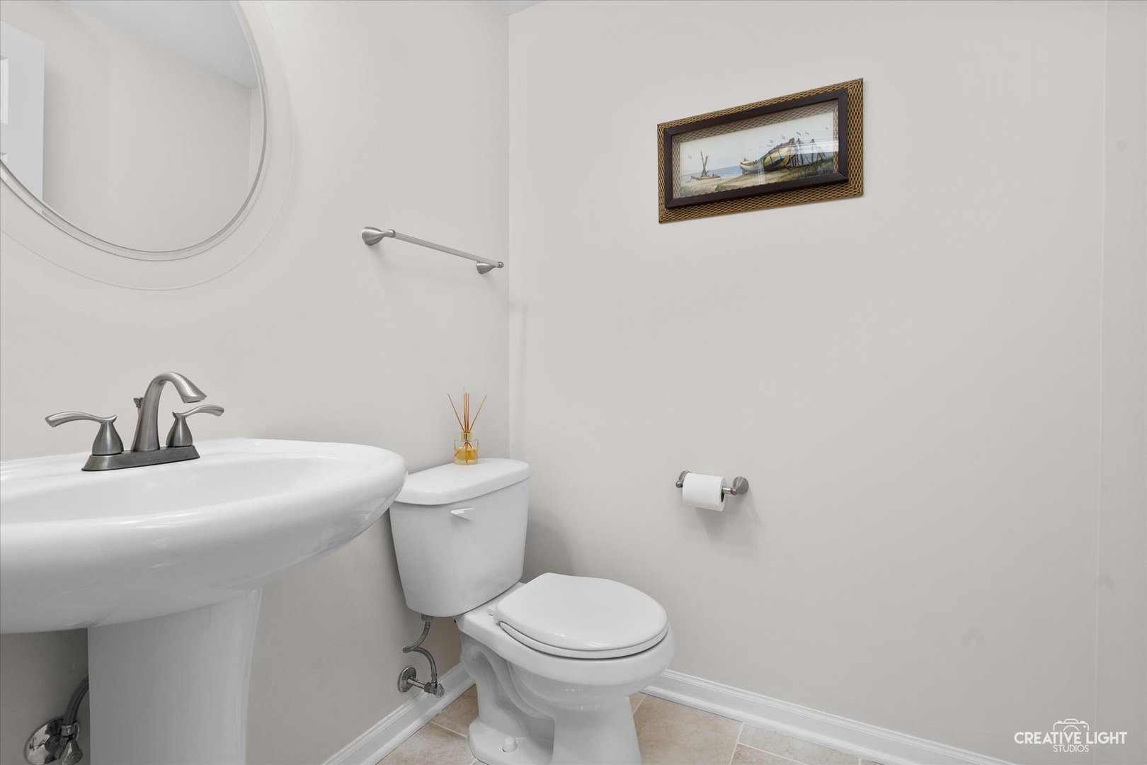3426 Cameron Drive, Unit 3426 Elgin, IL 60124 - Photo 7 of 17 a bathroom with a toilet sink and mirror