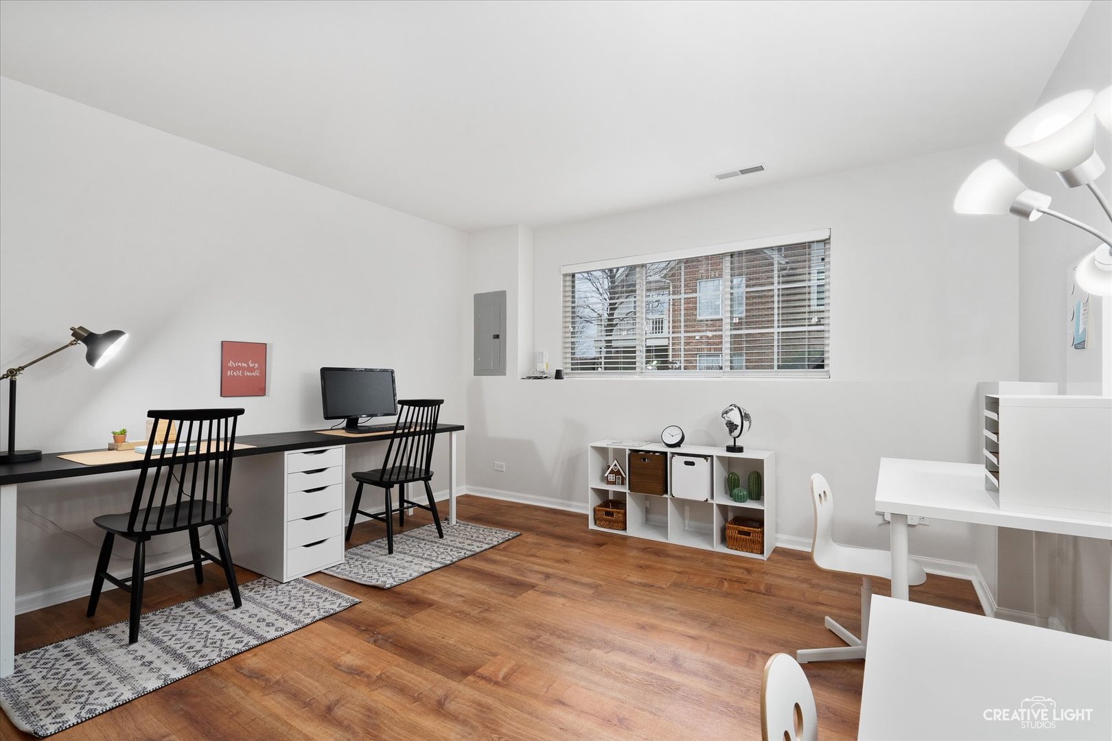 3426 Cameron Drive, Unit 3426 Elgin, IL 60124 - Photo 8 of 17 a view of a workspace with furniture and a window