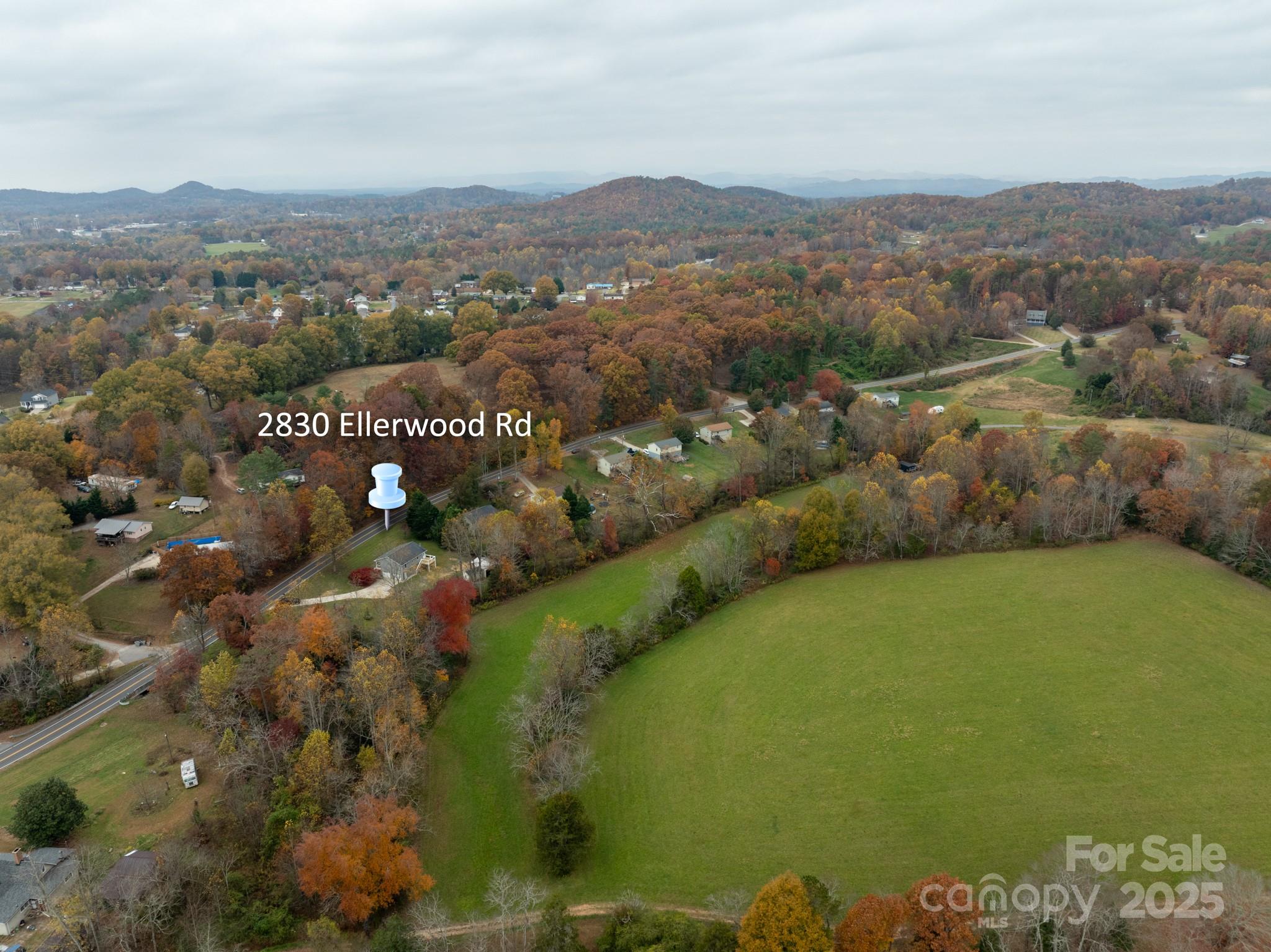 2830 Ellerwood Road Hudson, NC 28638 - Photo 13 of 46 a view of a city with mountains in the background