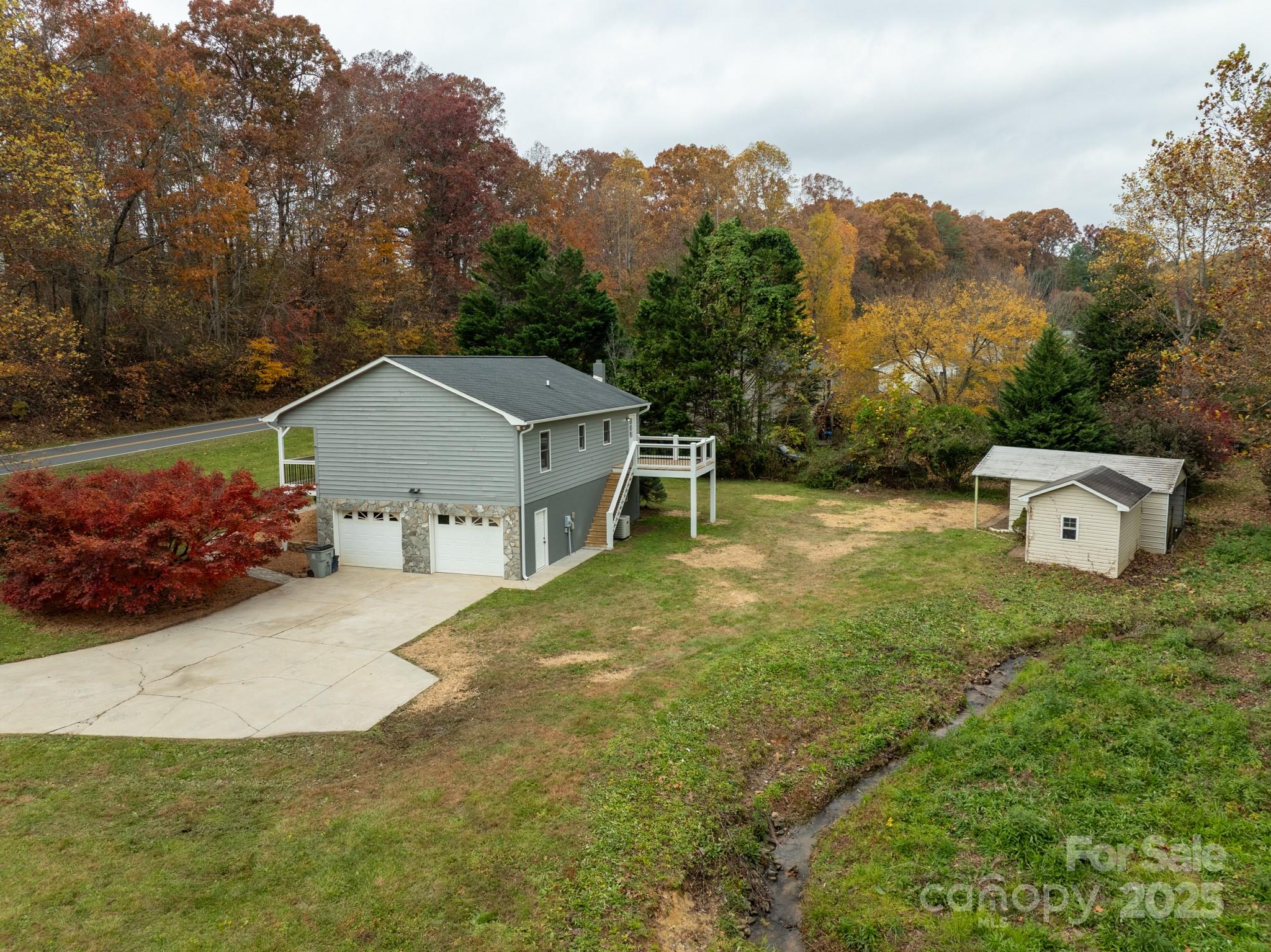 2830 Ellerwood Road Hudson, NC 28638 - Photo 16 of 46 an aerial view of a house with a yard