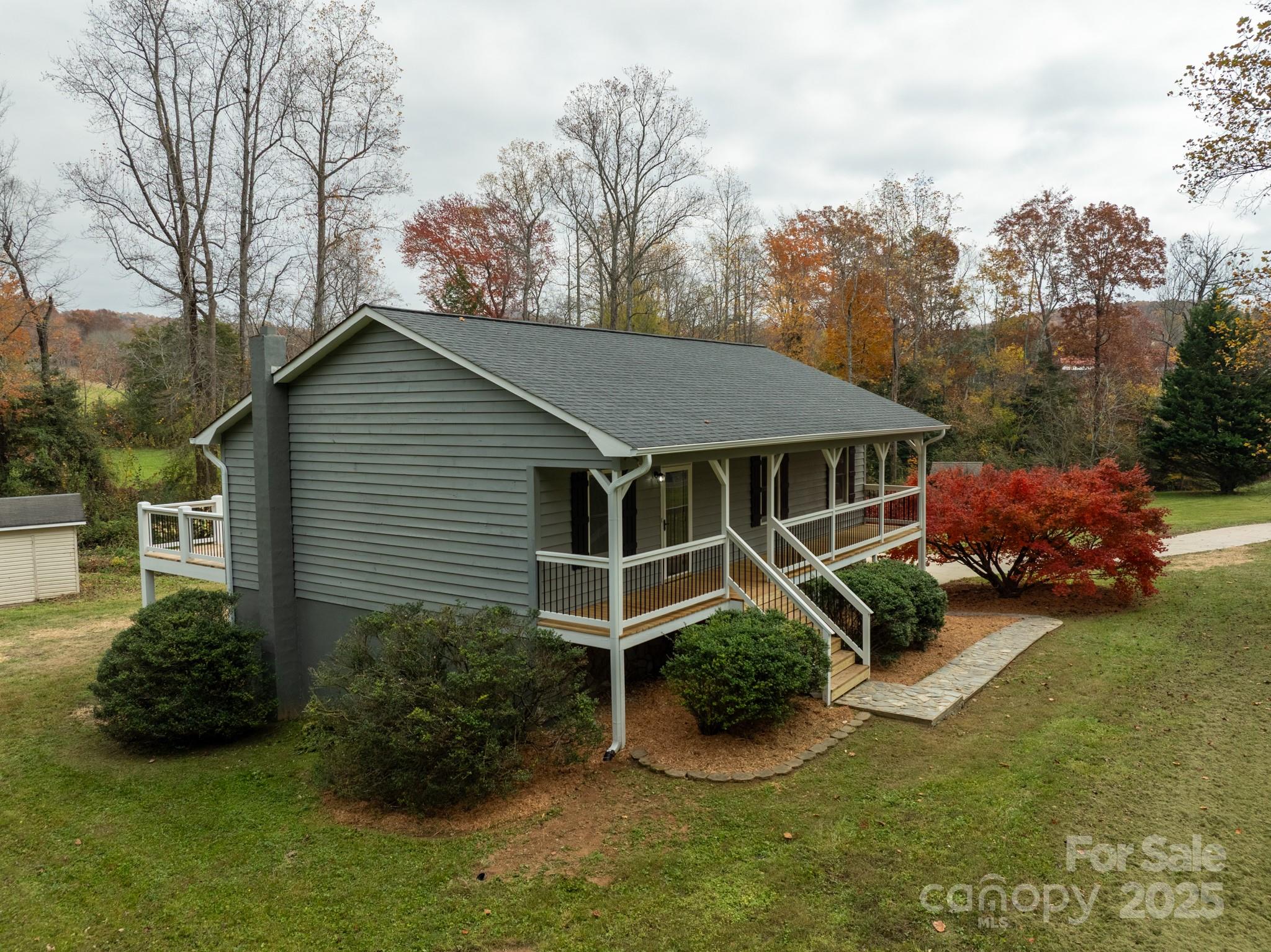2830 Ellerwood Road Hudson, NC 28638 - Photo 18 of 46 a view of a house with backyard