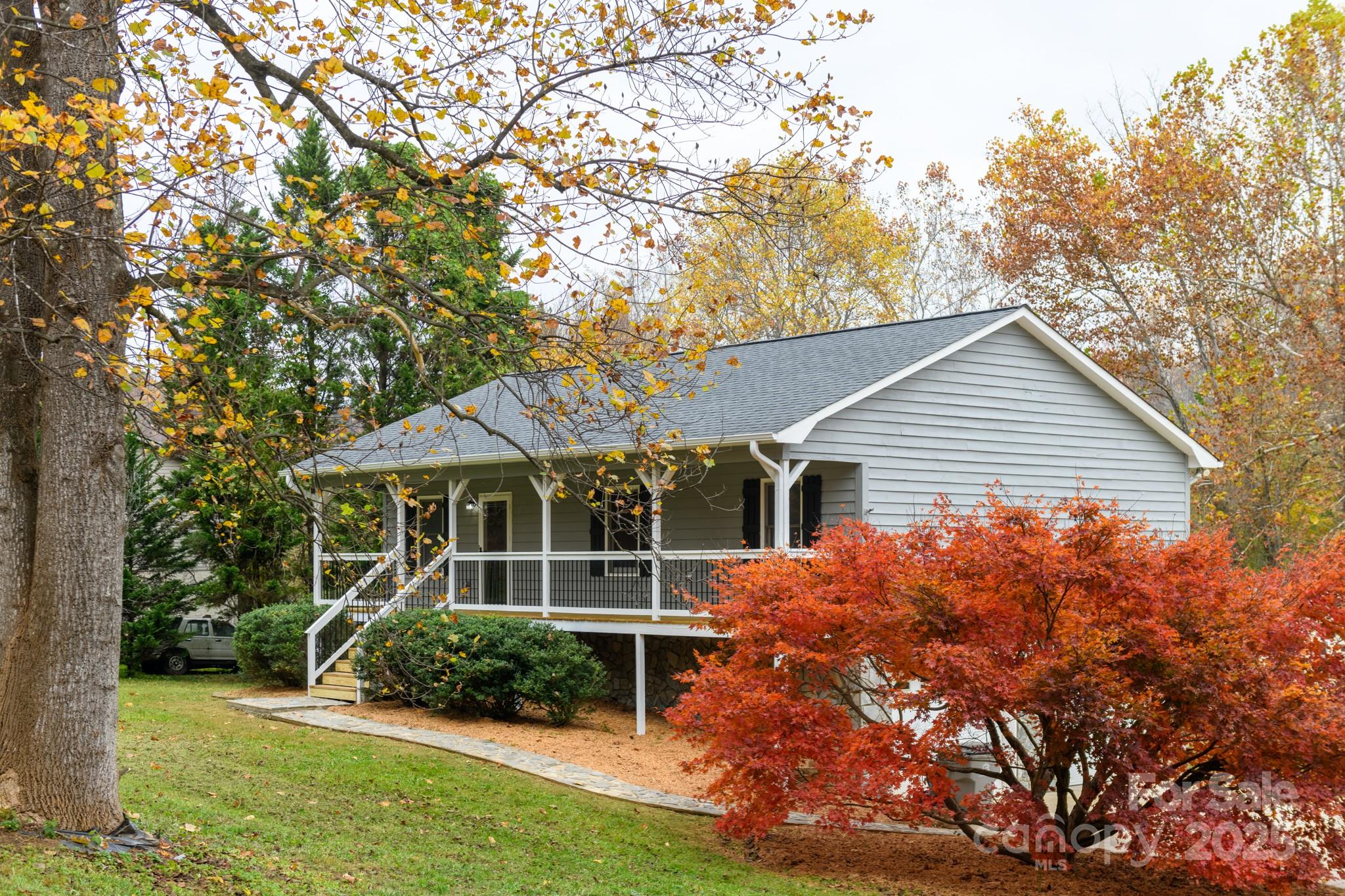 2830 Ellerwood Road Hudson, NC 28638 - Photo 19 of 46 a view of a house with backyard