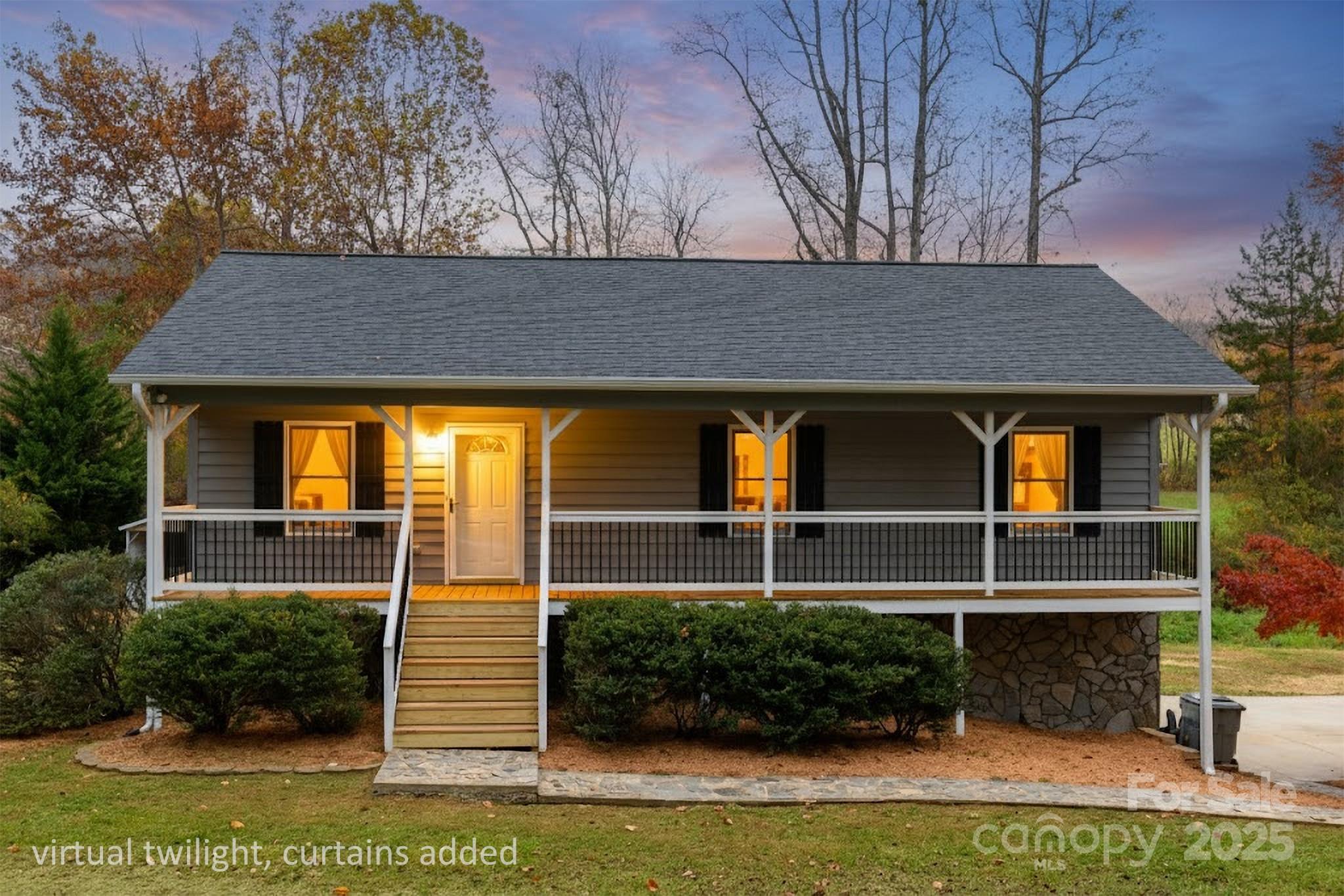 2830 Ellerwood Road Hudson, NC 28638 - Photo 28 of 46 a front view of a house with a yard