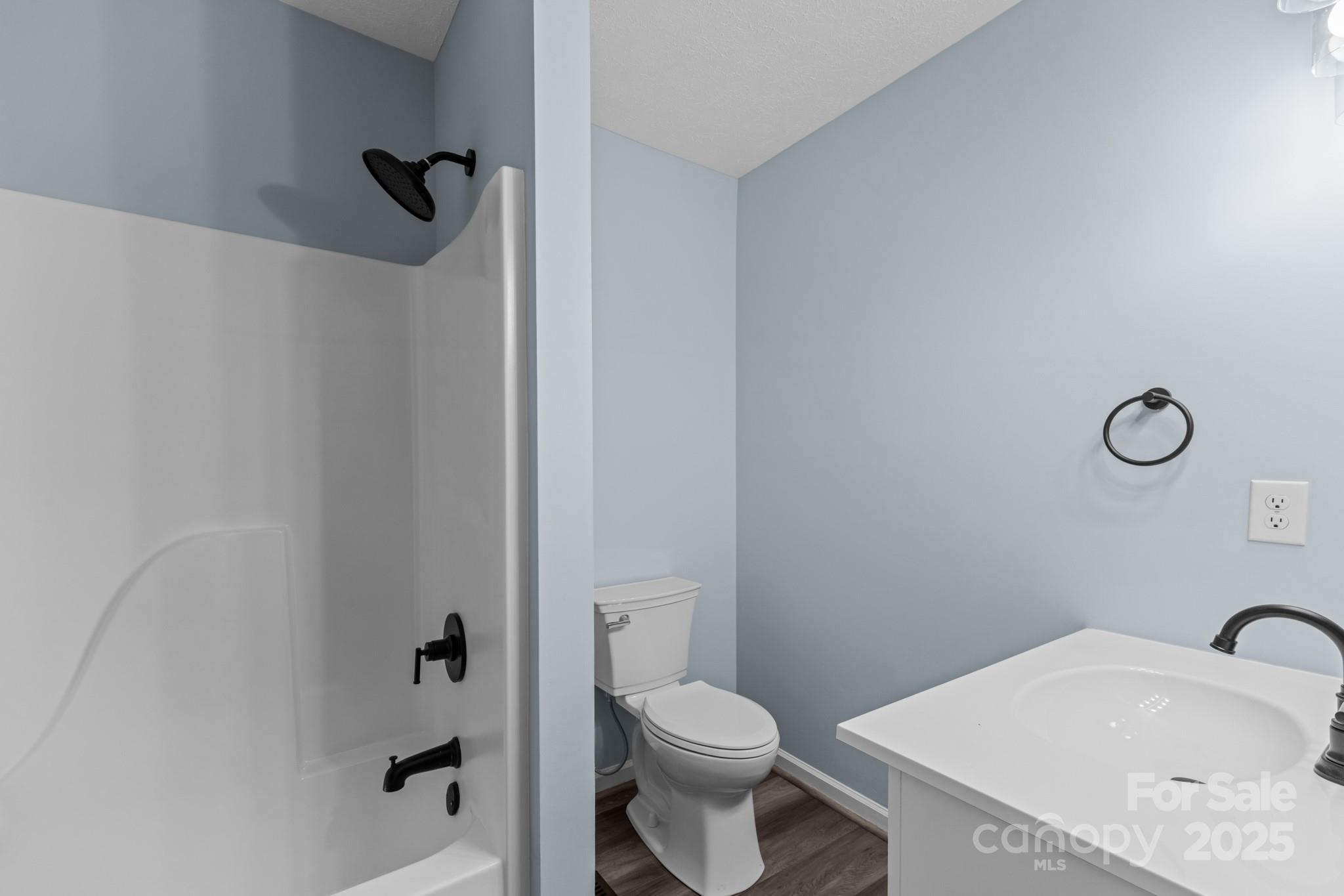 2830 Ellerwood Road Hudson, NC 28638 - Photo 36 of 46 a bathroom with a sink toilet and shower