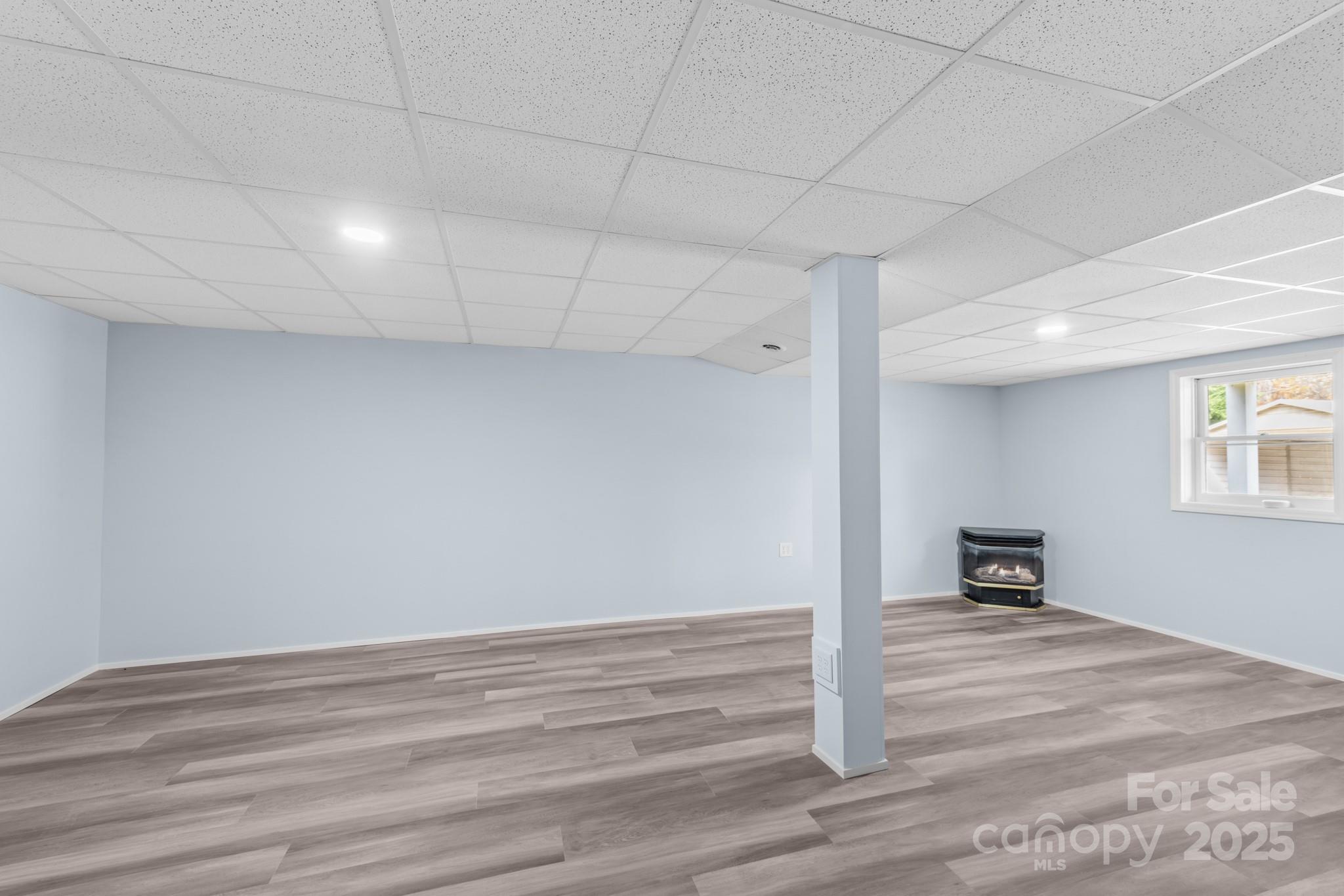 2830 Ellerwood Road Hudson, NC 28638 - Photo 42 of 46 a view of a livingroom with wooden floor and a window